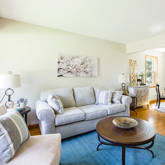 3 Seater Grey Sofa & Circular Wooden Center Table