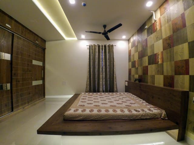 Minimalist Bedroom Featuring Extensive Wood Elements