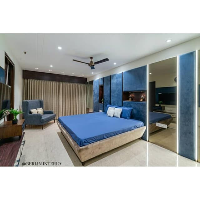 Modern Bedroom is Designed with a Soothing Blue and White