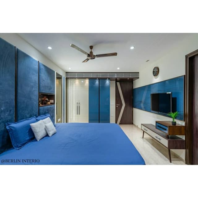 Modern Bedroom is Designed with a Soothing Blue and White