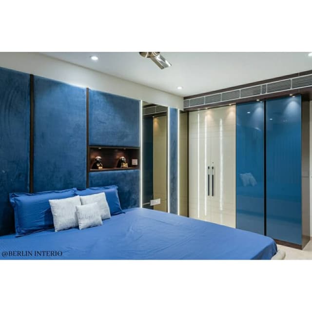 Modern Bedroom is Designed with a Soothing Blue and White