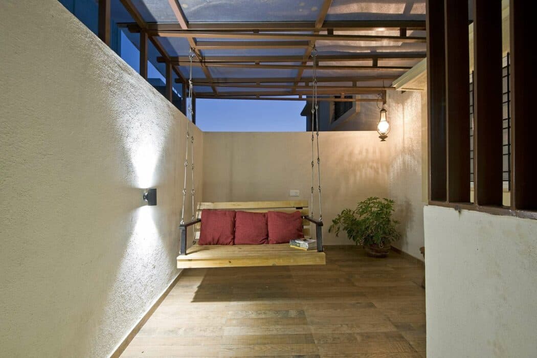 Verandah with Wooden Flooring and Creme-Painted Walls