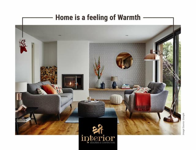 Features Two Stylish Grey Sofas Adorned with Patterned