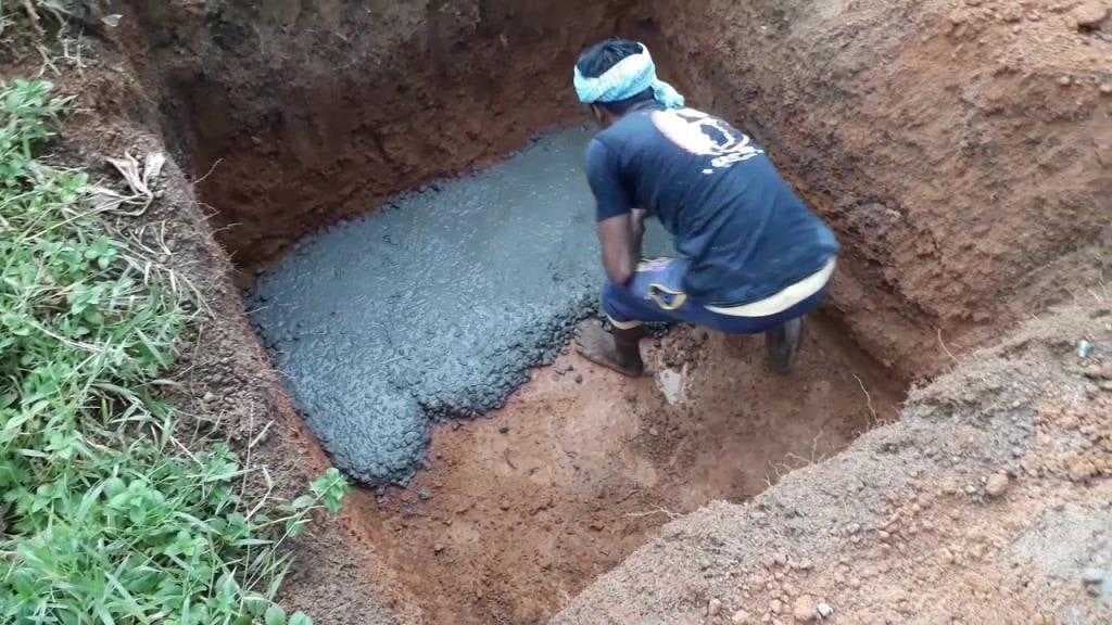 Laying of Plain Cement Concrete (PCC)in Excavated Pit – 01 – 0402030001 Laying of Plain Cement Concrete (PCC)in Excavated Pit Image