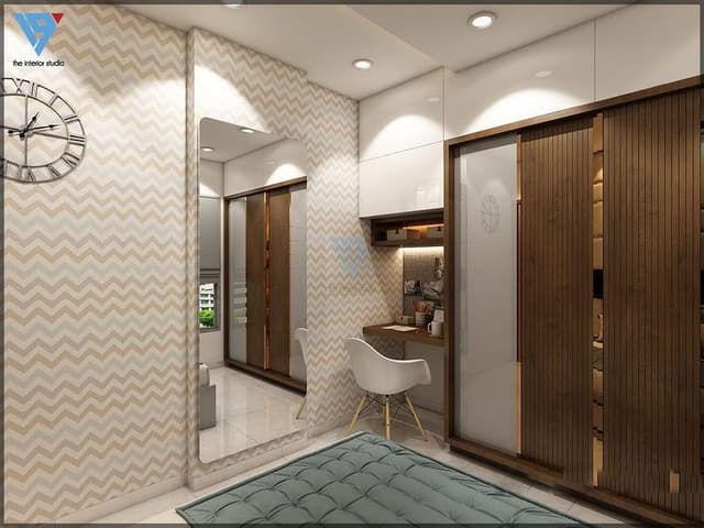 3-Sliding-Shutter-Wardrobe-in-Shades-of-Wood-White-with-a-Study-Working-Table-Beside-it Swiper Content 0