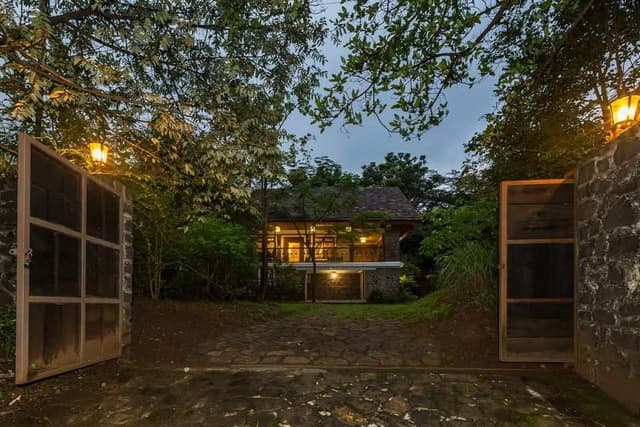 3-Story-Traditional-Bungalow-Farm-House-with-an-Contemporary-Touch-build-of-Natural-Stone-Brick-Exposed-Walls-Sloping-Roofs-with-Patterned-Eave-boards-3 Swiper Content 2