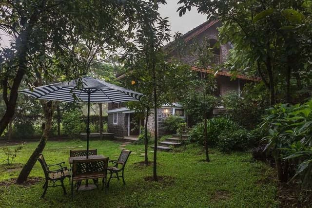 3-Story-Traditional-Bungalow-Farm-House-with-an-Contemporary-Touch-build-of-Natural-Stone-Brick-Exposed-Walls-Sloping-Roofs-with-Patterned-Eave-boards-5 Swiper Content 4