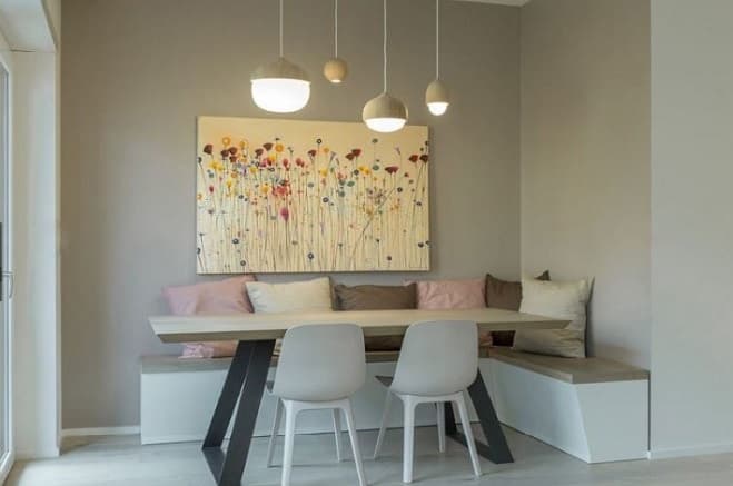 5-Seater-Corner-Dining-table-comprising-2-Chairs-Sectional-Seating-with-Wall-Mounted-Bench-finish-with-Marble-Top-with-Cushions-on-Back.-It-is-highlighted-with-Hanging-Pendant-Lights Design Detail Banner 0