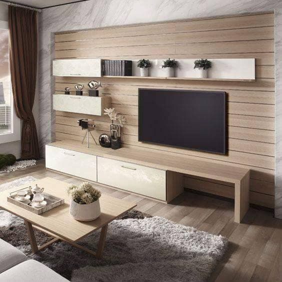 A-Minimalistic-TV-Stand-with-a-Wood-Panel-in-the-Combination-of-Ivory-White-will-Keep-any-Wall-Stylish-Organized.-Unit-is-Functional-Sleek-having-TV-Panel-Shelves-Low-Storage. Swiper Content 0