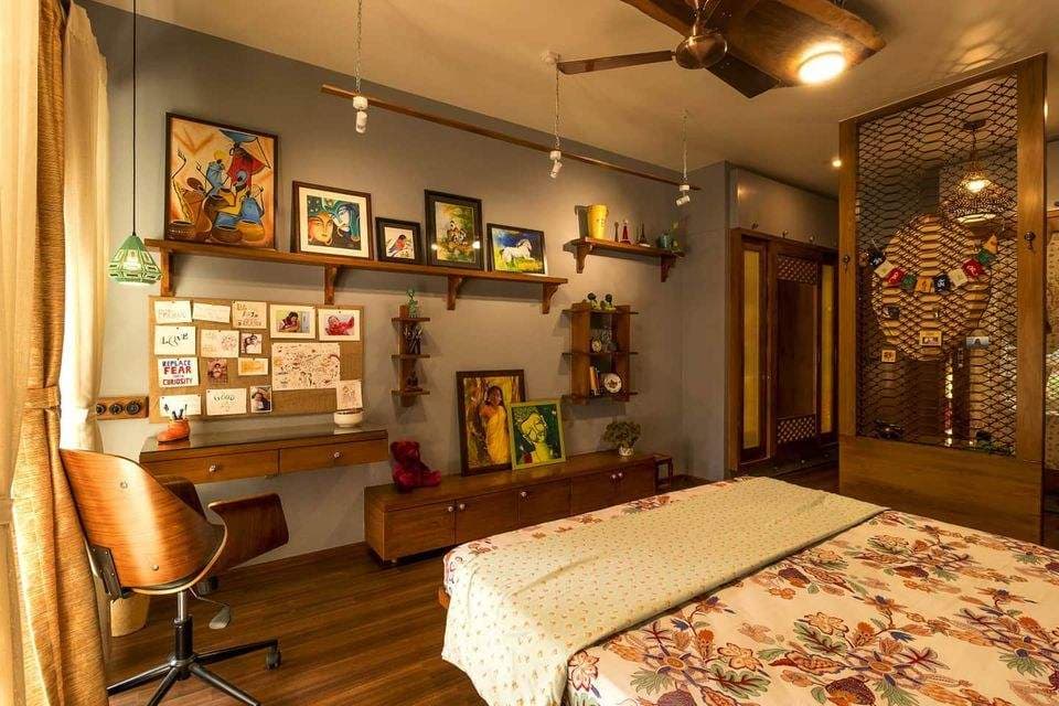 A-Modern-Rustic-Bedroom-is-well-designed-with-a-Gallery-Wall.-The-Bedroom-includes-Wooden-Platform-Bed-Wooden-Partition-with-Jali.-1 Design Detail Banner 0