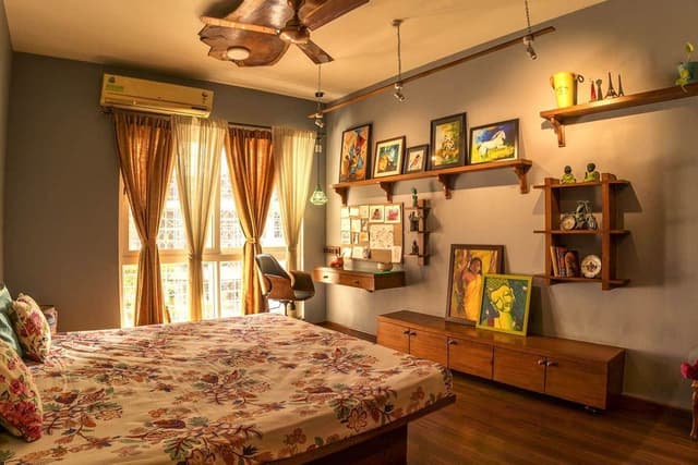 A-Modern-Rustic-Bedroom-is-well-designed-with-a-Gallery-Wall.-The-Bedroom-includes-Wooden-Platform-Bed-Wooden-Partition-with-Jali.-2 Swiper Content 1