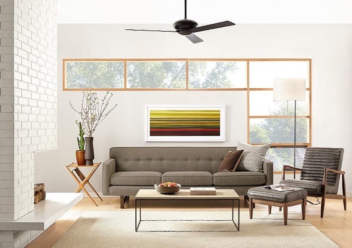 A-Modern-Style-3-Seater-Sofa-having-Grey-Upholster-Wooden-Legs-is-Thoughtfully-Place-in-this-Space. Design Detail Banner 0