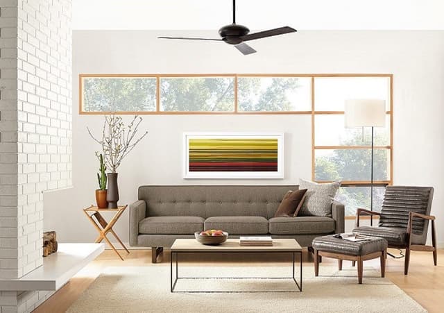 A-Modern-Style-3-Seater-Sofa-having-Grey-Upholster-Wooden-Legs-is-Thoughtfully-Place-in-this-Space. Swiper Content 0