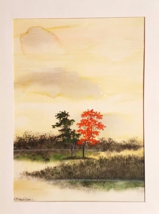 A-Pair-of-Tree-on-a-Small-Island-Red-Green.-This-Nature-Painting-is-done-on-a-Paper-with-Water-Colour-best-suitable-for-Home-Decor.-Its-Size-is-12-inch-X-16-inch.-Contact-Mr.-Prabhashank Swiper Content 0