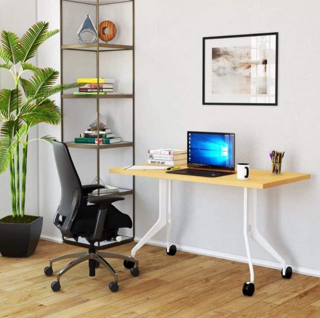 A-Portable-Study-Table-has-Wheels-at-the-Powder-Coated-Metal-Legs-to-Easy-Transport-it-From-one-Corner-to-another. Swiper Content 0