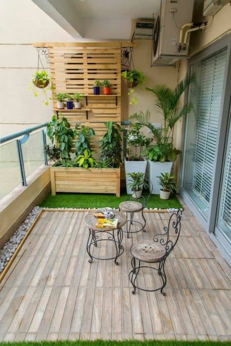 Awesome-Balcony-with-Green-Grass-Carpet-Pebble-Wooden-Flooring Swiper Content 0
