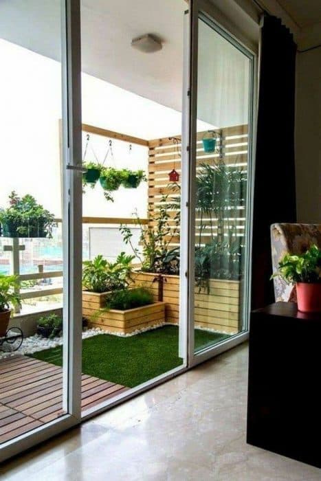 Balcony-Garden-access-through-Glazed-Doors-having-Green-Grass-Carpet Design Detail Banner 0