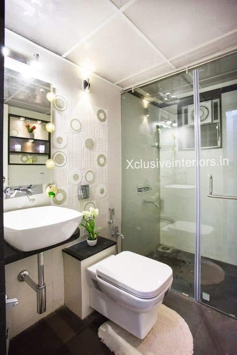 Bathroom-accommodating-Table-Top-Wash-Basin-on-Black-Granite-Countertop Swiper Content 0