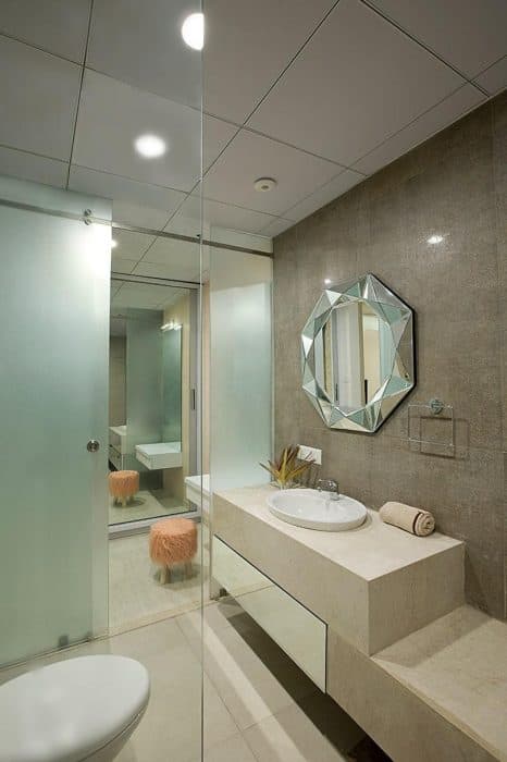 Bathroom-incorporating-WC-Built-in-Wash-Basin-on-Stone-Countertop-with-Storage-Cabinet-below Swiper Content 0