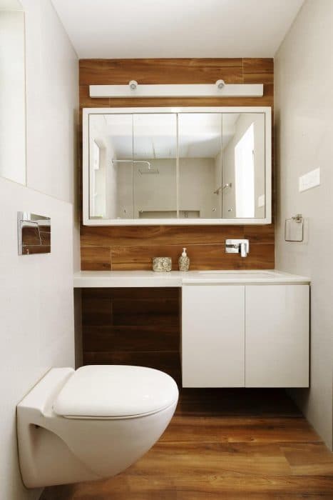 Bathroom-with-Wooden-Flooring-comprises-of-Wash-Basin-with-Built-in-Solid-White-Marble-Counter-Top Design Detail Banner 0