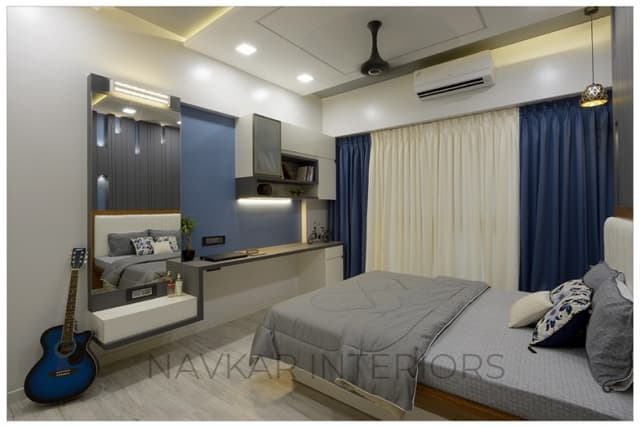 Bedroom-accommodating-Wooden-Double-Bed-with-Storage-below-Cushioned-Wooden-Headboard-Bed-Back-Wall-with-MDF-Wall-Panelling-highlighted-with-Vertical-Grooves-1 Swiper Content 0