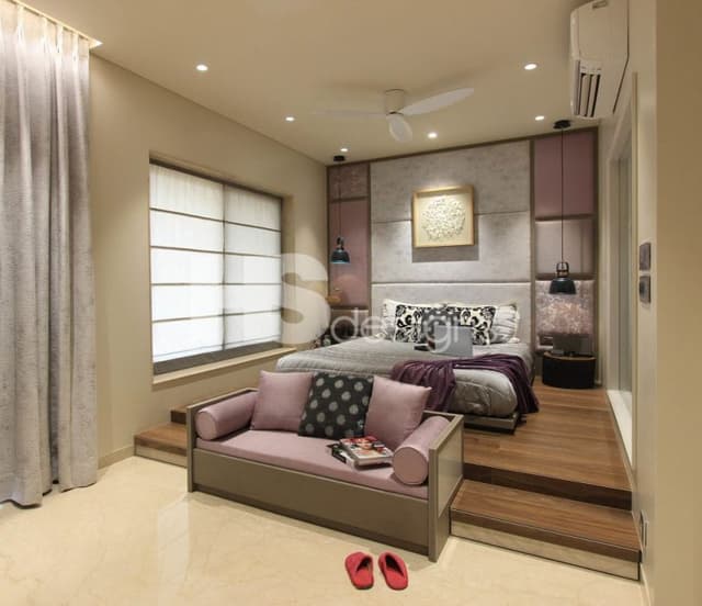 Bedroom-in-Neutral-Theme-consisting-two-step-up-Wooden-Low-Heighted-Bed-Side-tables-Table-Lamps-Bed-End-Bench-with-Cushions-Cushioned-Headboard-extended-till-Ceiling-with-Wall-Art Swiper Content 0