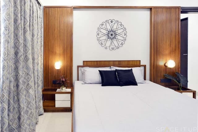 Bedroom-with-Wooden-Double-Bed-with-Storage-below-Bed-Back-Wall-with-Wooden-Headboard-Metal-Wall-Decor-2 Swiper Content 1