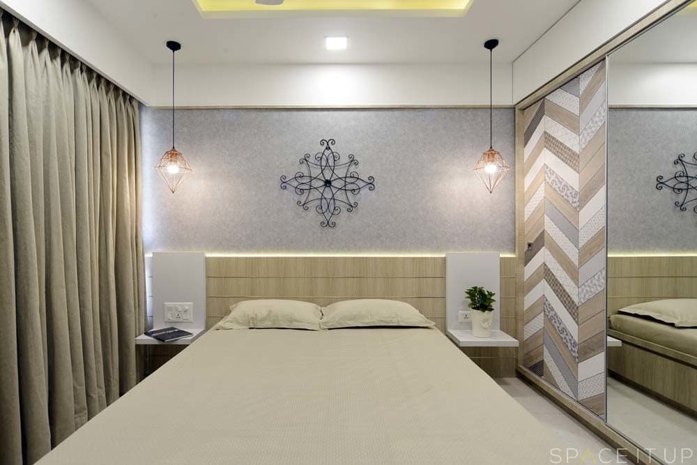 Bedroom-with-Wooden-Double-Bed-with-Storage-below-Wall-Mounted-Wooden-Side-Tables-Wooden-Headboard-with-Cove-Light-Bed-Back-Wall-with-Grey-Shaded-Wallpaper Design Detail Banner 0