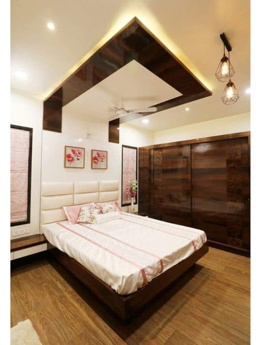 Bedroom-with-Wooden-Flooring-comprises-of-Wooden-Double-Bed-with-Storage-below-1 Design Detail Banner 0