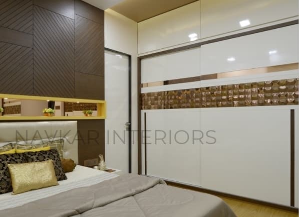 Bedroom-with-Wooden-Flooring-comprises-of-Wooden-Double-Bed-with-Storage-below-Wall-Mounted-Wooden-Side-Tables-Tufted-Upholstered-Headboard-2 Swiper Content 1