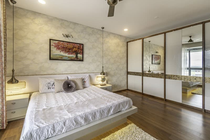 Bedroom-with-Wooden-Flooring-comprises-of-Wooden-Double-Bed-with-Storage-below-highlighted-with-Cove-Light-2 Design Detail Banner 1