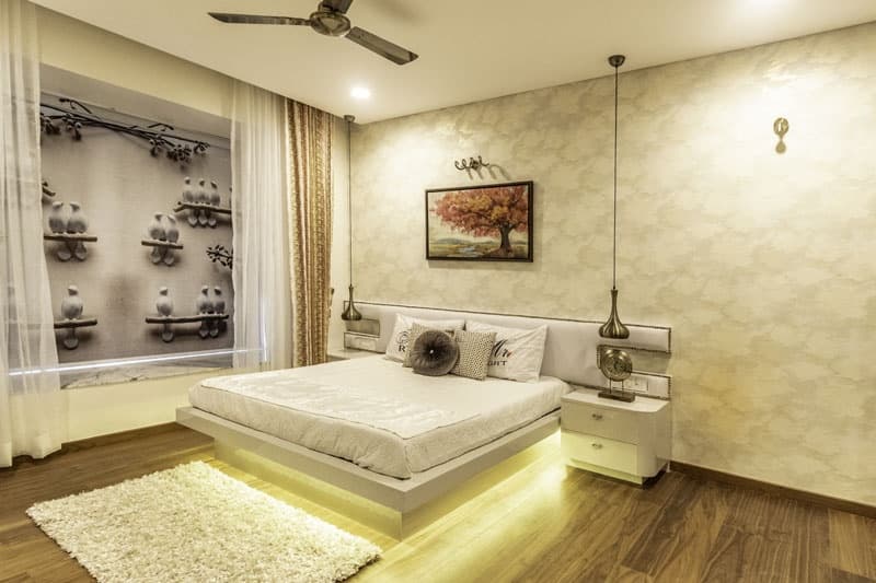 Bedroom-with-Wooden-Flooring-comprises-of-Wooden-Double-Bed-with-Storage-below-highlighted-with-Cove-Light-3 Design Detail Banner 2