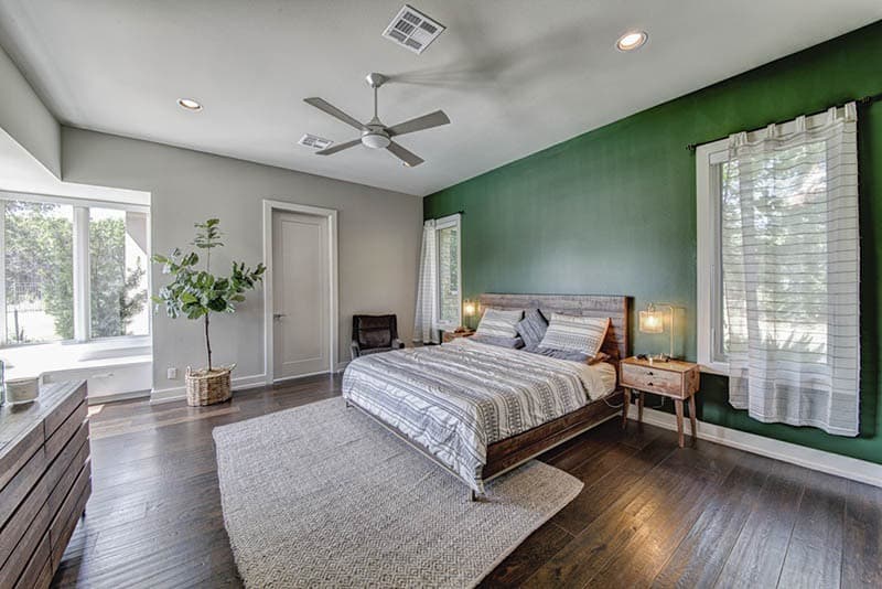 Bedroom-with-Wooden-Flooring-comprises-of-Wooden-Double-Bed Design Detail Banner 0