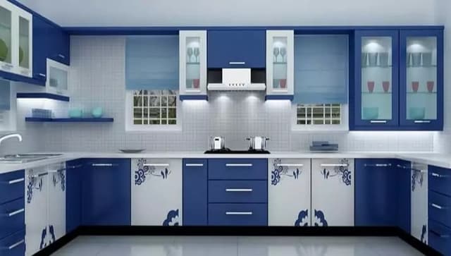 Blue-and-White-Themed-Kitchen-with-U-Shaped-Kitchen-Counter-Built-in-Stove-with-Chimney-SS-Single-Bowl-Sink-with-Drainboard-Lower-Cabinets-with-SS-Handles-Upper-Cabinets. Swiper Content 0