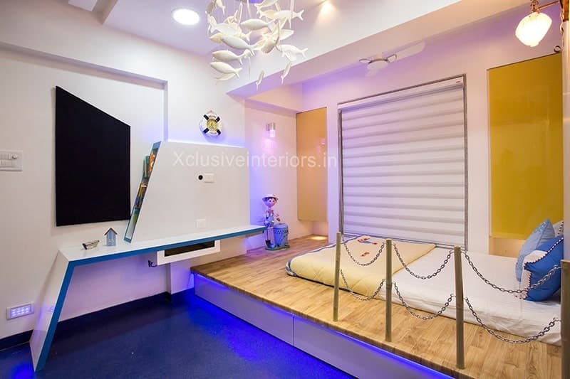 Children-Bedroom-with-Raised-Floor-having-Space-for-Single-Mattress-Safety-Railings-with-Storage. Design Detail Banner 0