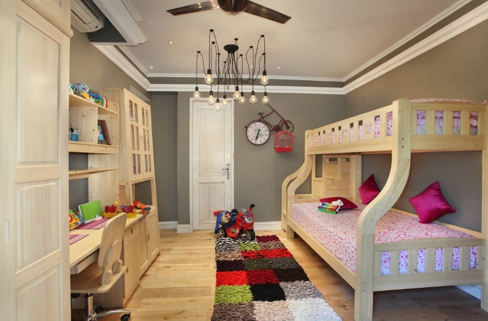 Childrens-Bedroom-with-Wooden-Flooring-comprises-of-Wooden-Bunk-Bed-Colourful-Rug-Wooden-Study-Table-with-Wall-Mounted-Shelves-Open-Display-Cabinet-for-Storage Design Detail Banner 0
