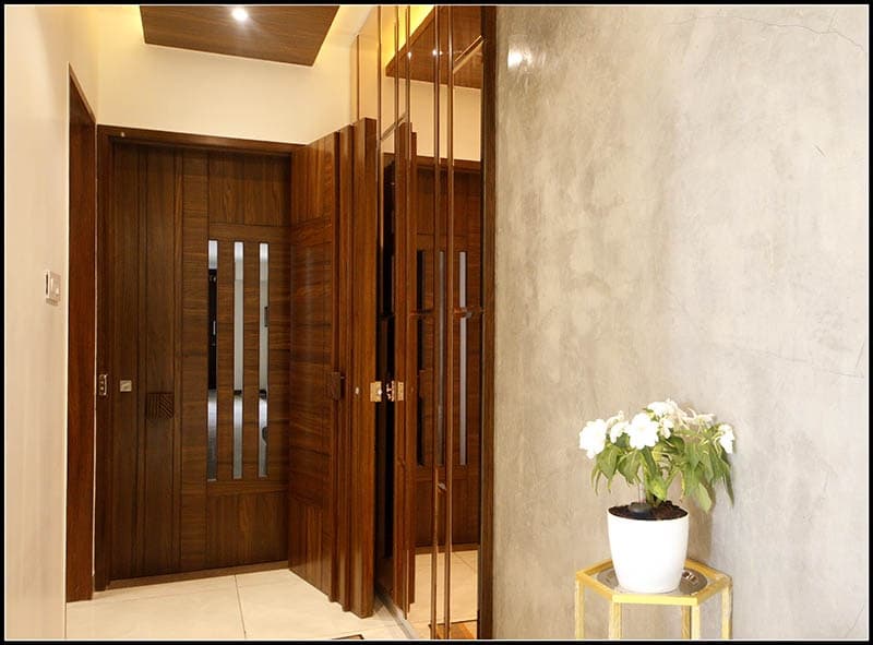 Combination-of-Entrance-Wooden-Doors-highlighted-with-Vertical-Groove-Wooden-Handle-1 Entrance Door
