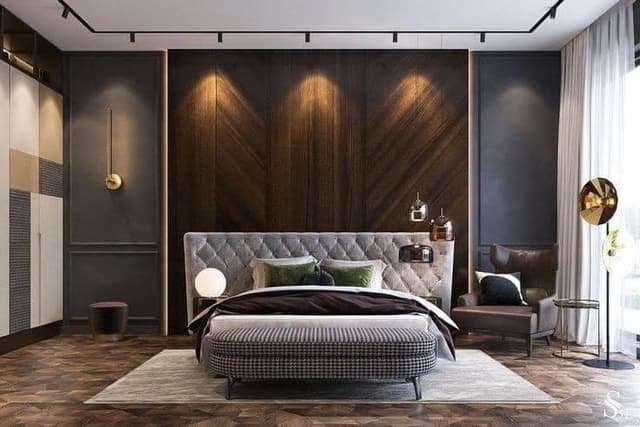 Contemporary-Bedroom-designed-with-Wooden-Bed-Cushioned-Headboard-Wooden-Backwall-highlighted-by-Spot-Lights Swiper Content 0