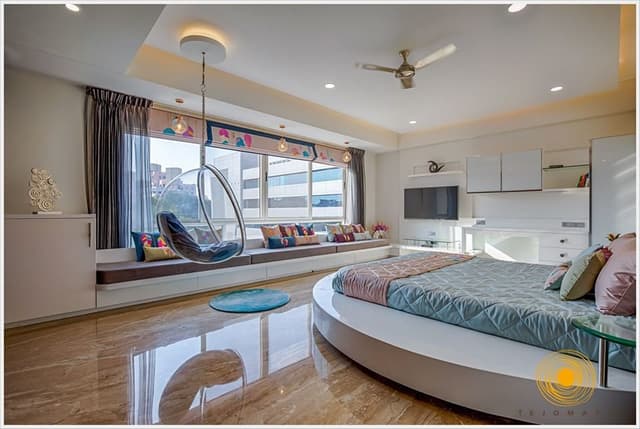Contemporary-Designed-Bedroom-accommodating-Round-Wooden-Low-Heighted-Bed-1 Swiper Content 0