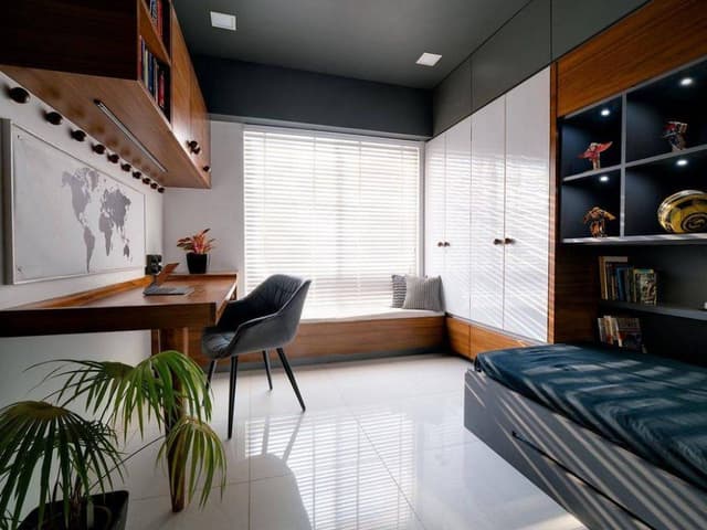 Contemporary-Styled-Bedroom-incorporating-Single-Wooden-Bed-Wooden-Study-Table-with-Wall-Mounted-Wooden-Cabinet-with-Under-Cabinet-LED-Light-Cushioned-Chair Swiper Content 0