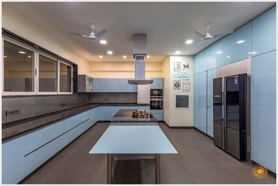 Contemporary-Styled-Light-Blue-Coloured-Island-Kitchen-comprises-of-L-Shaped-Kitchen-Counter-with-Dark-Grey-Shaded-Grained-Kitchen-Countertop-1 Design Detail Banner 0