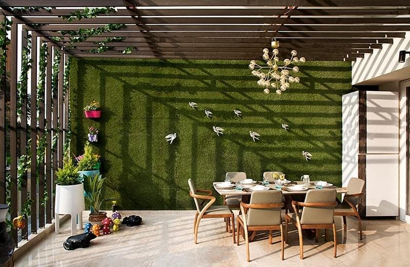 Contemporary-Styled-Semi-Open-Dining-Area-incorporates-6-Seater-Dining-Table-with-Marble-Tabletop-with-Modern-Atomic-Chandelier-above.-2 Design Detail Banner 0