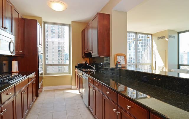 Corridor-Kitchen-Parallel-Kitchen-Galley-Kitchen-with-Upper-Cabinets Swiper Content 0