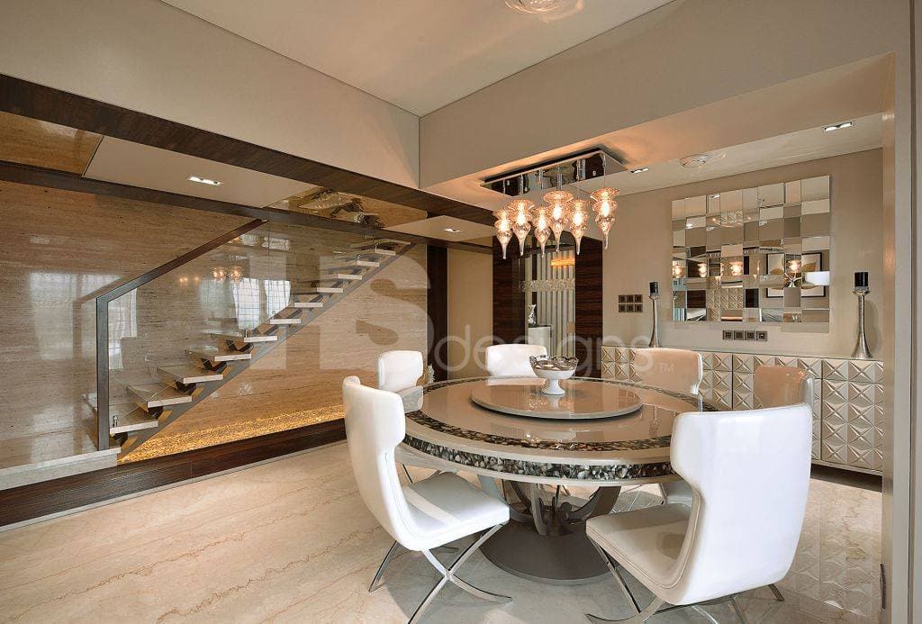 Dining-Room-incorporating-6-Seater-Revolving-Circular-Dining-Table-with-Marble-Top-and-Metal-Base-White-Cushioned-Dining-Chairs-with-Metal-Legs. Design Detail Banner 0