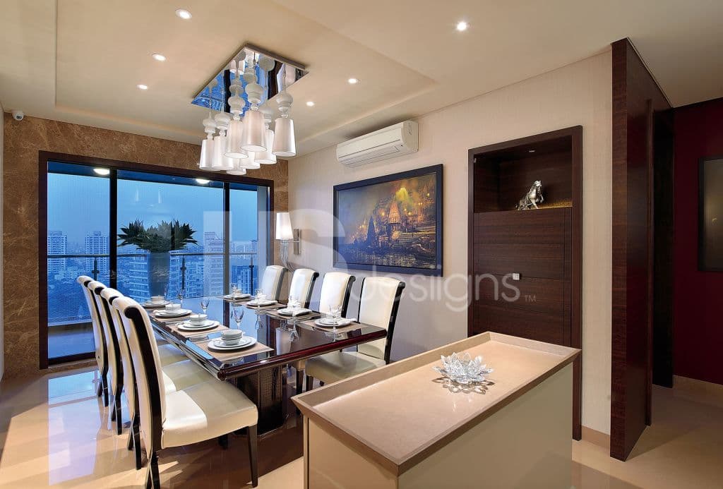 Dining-Room-with-overlooking-Glazed-Balcony-accomodating-8-Seater-Dining-Table-with-Glossy-Table-Top. Design Detail Banner 0