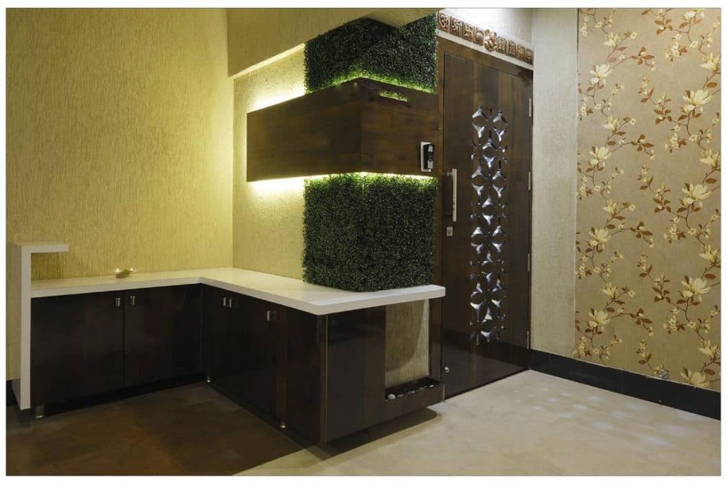 Entrance-Area-comprising-of-CNC-Cut-Wooden-Jali-Door-with-Stainless-Steel-Handles Design Detail Banner 0
