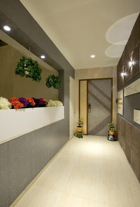 Entrance-Foyer-leading-to-the-Main-Door-with-CNC-Cut-Jali Swiper Content 0