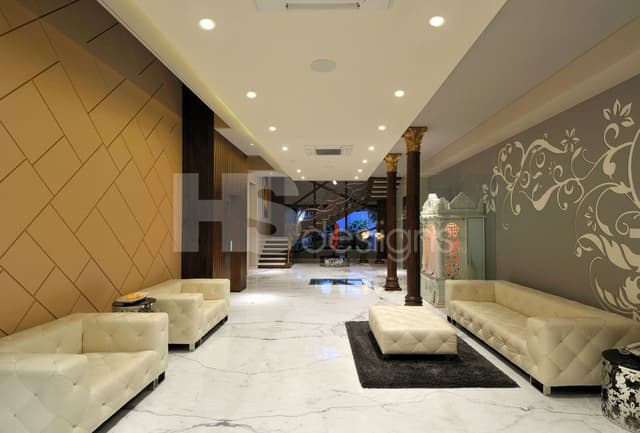 Formal-Living-Area-comprising-White-Marble-Flooring Swiper Content 0