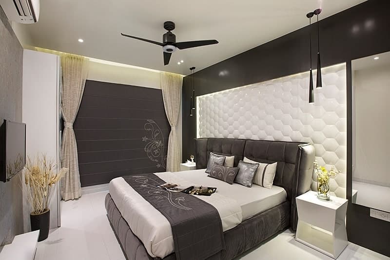 Grey-Themed-Bedroom-with-Velvet-Upholstered-Double-Bed-Tufted-Grey-Velvet-Headboard-Side-Tables-with-Decor-Vase-01 Design Detail Banner 0