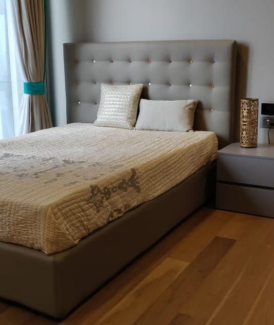 Grey-Upholstered-Single-Bed-with-Vertical-Stitched-Pattern-Bedsheet-is-adding-a-texture. Swiper Content 0